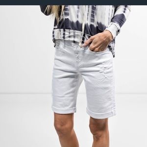 White distressed shorts